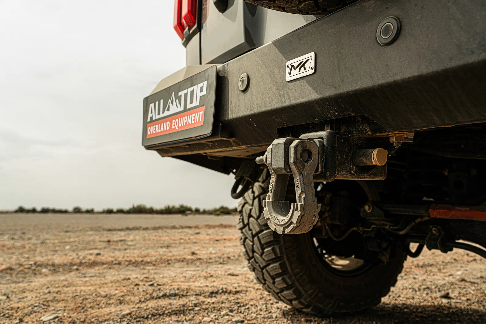 ALL-TOP recovery shackle mounted on an off-road vehicle beneath the rear bumper